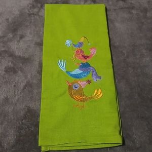 Green tea towel with pink purple blue orange birds